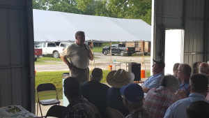 Tyron Spearman addresses a group of farmers and the agribusiness community. Mr. Spearman was optimistic for the peanut market in 2017.